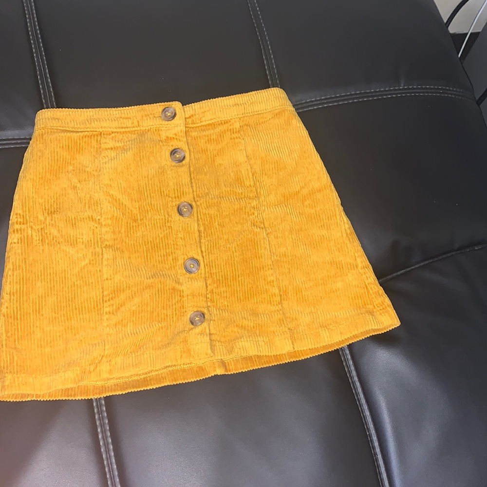 Yellow button down mini skirt in size 0/girls 12